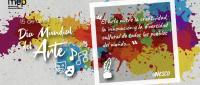 Se ilustra una pared con motas de pintura de diferentes colores, simbolos de art