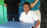 estudiante en pupitre