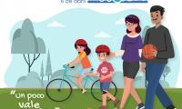 Niños y niñas, y adultos hacen ejercicios.